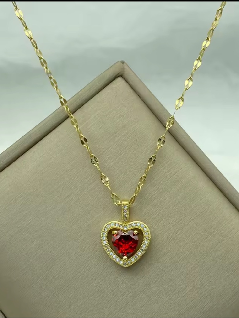 Gold Heart Pendant Necklace with Red Gem